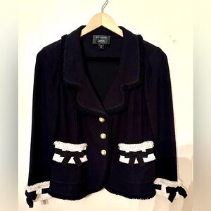St. John black with white trim boucle jacket. Size 12. Excellent condition.